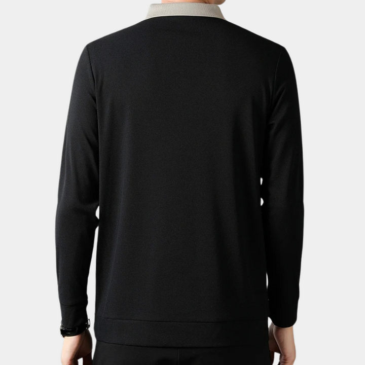 "Zwarte herenpolo met korte mouwen, elegante pasvorm, klassieke polohals, veelzijdig voor zomer casual wear."