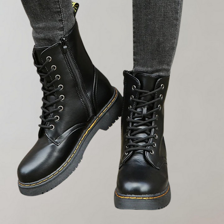 Zwarte leren dameslaars met veters, elegant design, klassiek en duurzaam, perfect voor dagelijks gebruik en speciale gelegenh