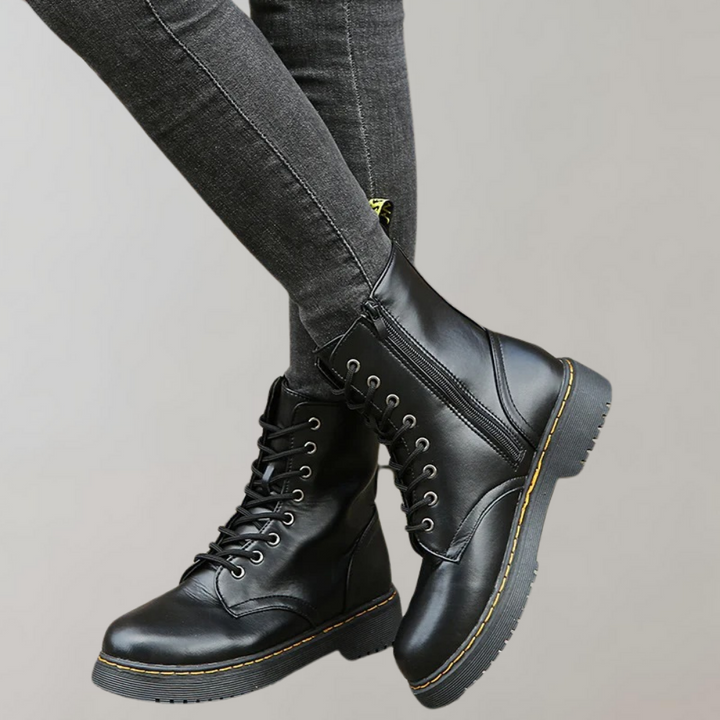 Zwarte leren dameslaars met veters, elegant design, klassiek en duurzaam, perfect voor dagelijks gebruik en speciale gelegenh