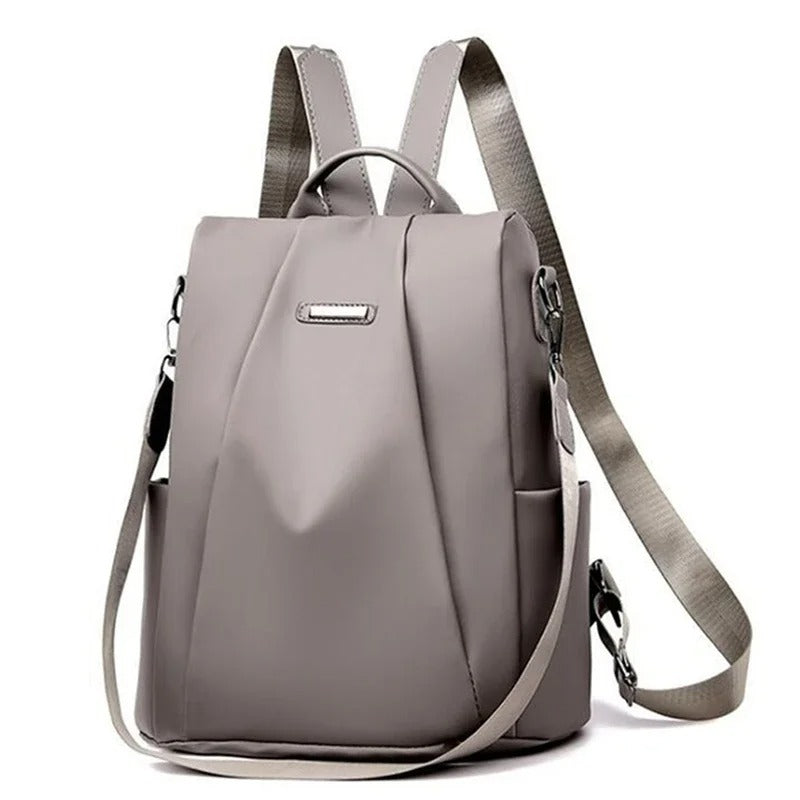 Veelzijdige khaki nylon tas: te dragen als crossbody, schoudertas of rugzak voor dames.