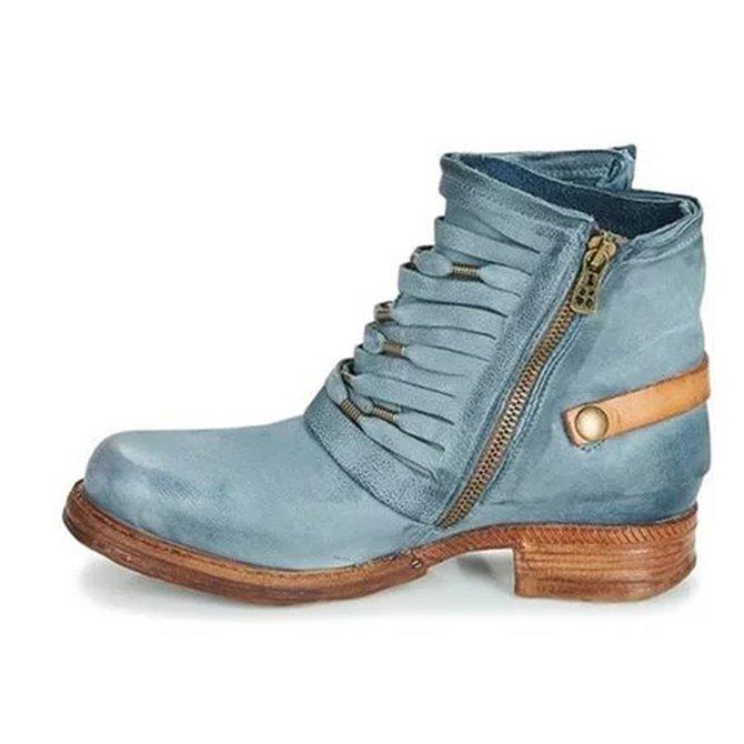 Grijze vintage dames enkellaarsjes met robuuste blokhak en ritssluiting, perfecte schoenen voor een comfortabele retro look.