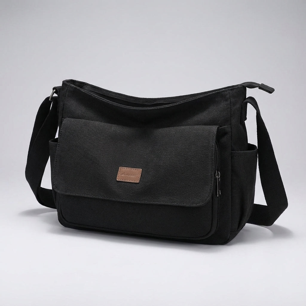 Georganiseerde interieur van de Satchelix laptop schoudertas, met vakken voor 15.6 inch laptop en accessoires.
