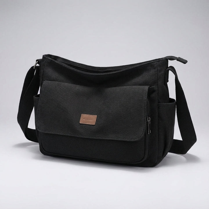 Georganiseerde interieur van de Satchelix laptop schoudertas, met vakken voor 15.6 inch laptop en accessoires.