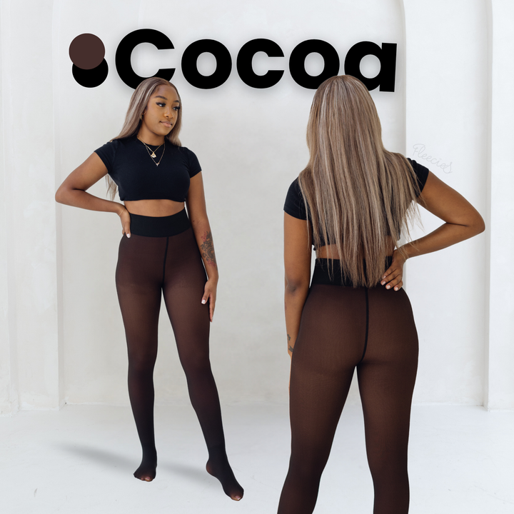 "Zwarte slimfit fleece panty met transparante look en vormend effect voor stijl en warmte in de koude maanden."