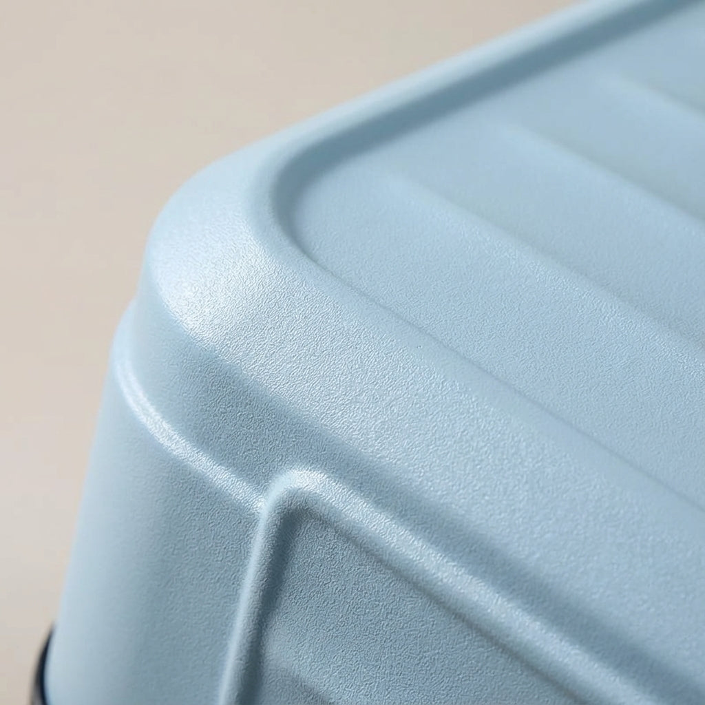 Roze geribbelde hardcase reiskoffer, duurzame en stijlvolle reisaccessoire.
