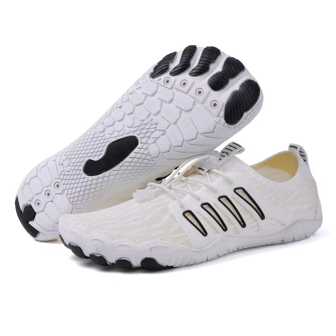 "Zwarte uniseks barefoot schoenen, orthopedisch design, ademend textiel, lichtgewicht, geschikt voor alle seizoenen."