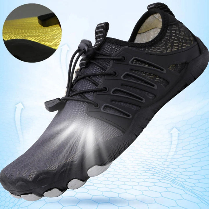 "Zwarte uniseks barefoot schoenen, orthopedisch design, ademend textiel, lichtgewicht, geschikt voor alle seizoenen."