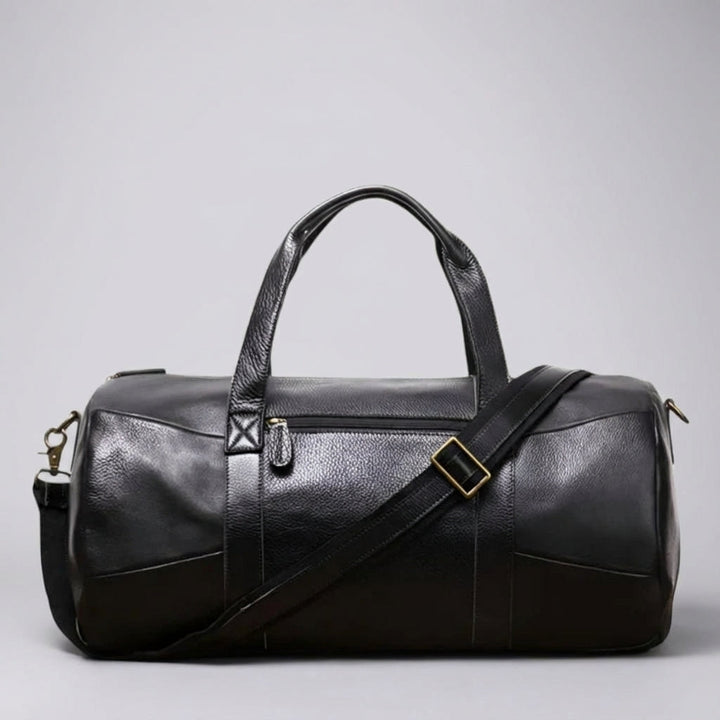 Stijlvolle vintage bruine reistas / duffelbag, ideaal als ruime handbagage voor weekendtrips.