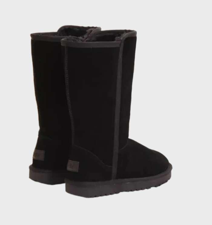 Zwarte waterdichte dameslaarzen met warme voering, ideaal voor winterse omstandigheden en comfortabel.