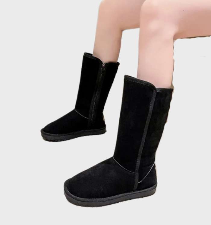 Modieuze bruine winterlaarzen voor dames, waterdicht en warm gevoerd met een tijdloos design.