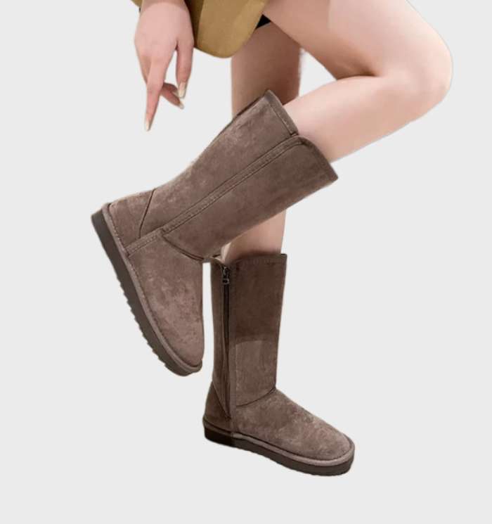 Comfortabele zwarte gevoerde dameslaarzen, perfect als waterdichte winterlaarzen voor dagelijks gebruik.
