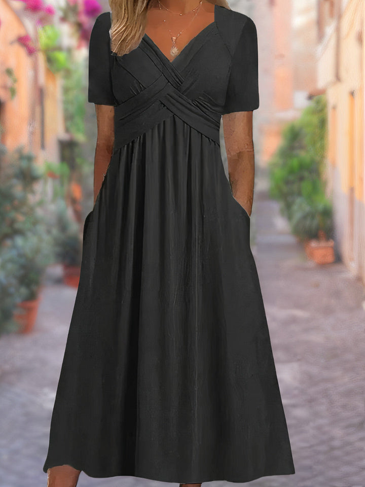 Blauwe zomerjurk met V-hals, perfect voor dames in de zomer
